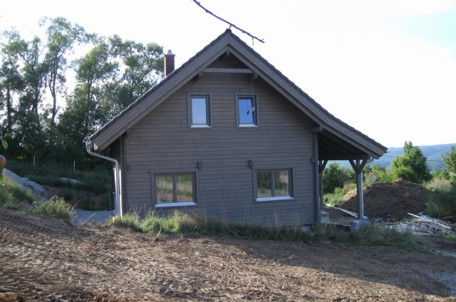 Podkrovní srubový dům Beroun