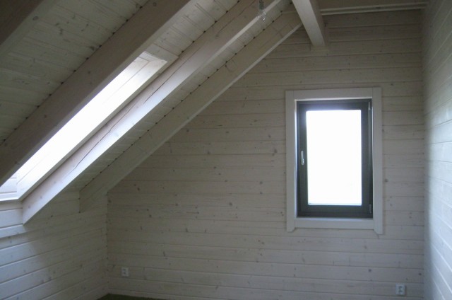 Podkrovní srubový dům Beroun