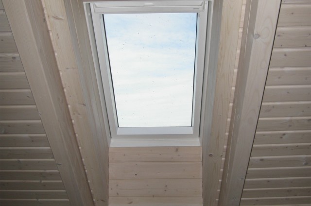 Podkrovní srubový dům Beroun