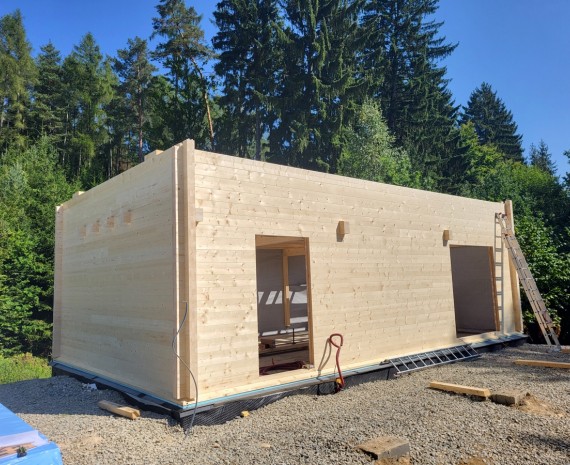 Podkrovní srubový dům